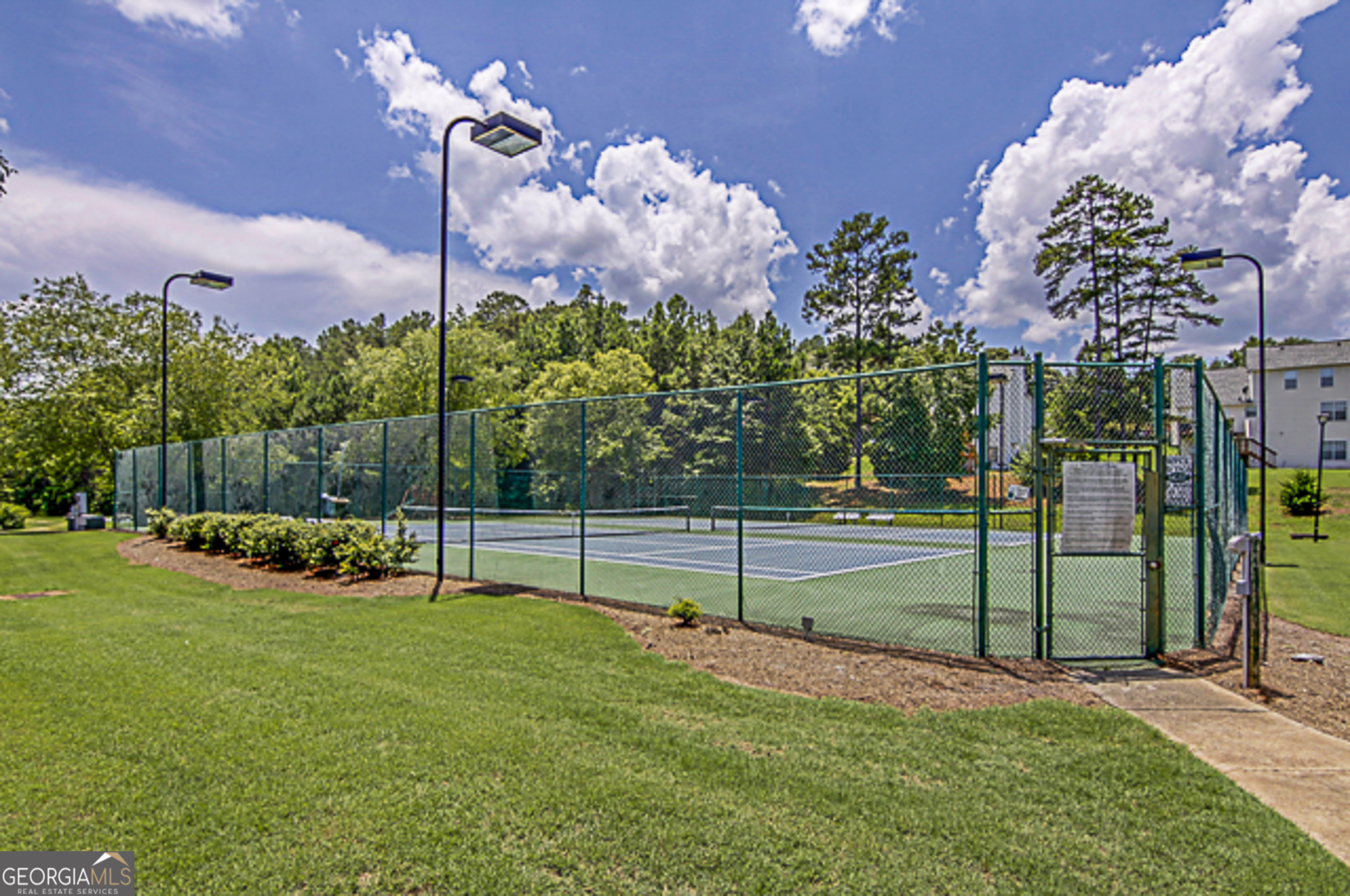 12350 Riviera Drive Fayetteville, GA 30215 - Photo 43 of 49 a view of a garden