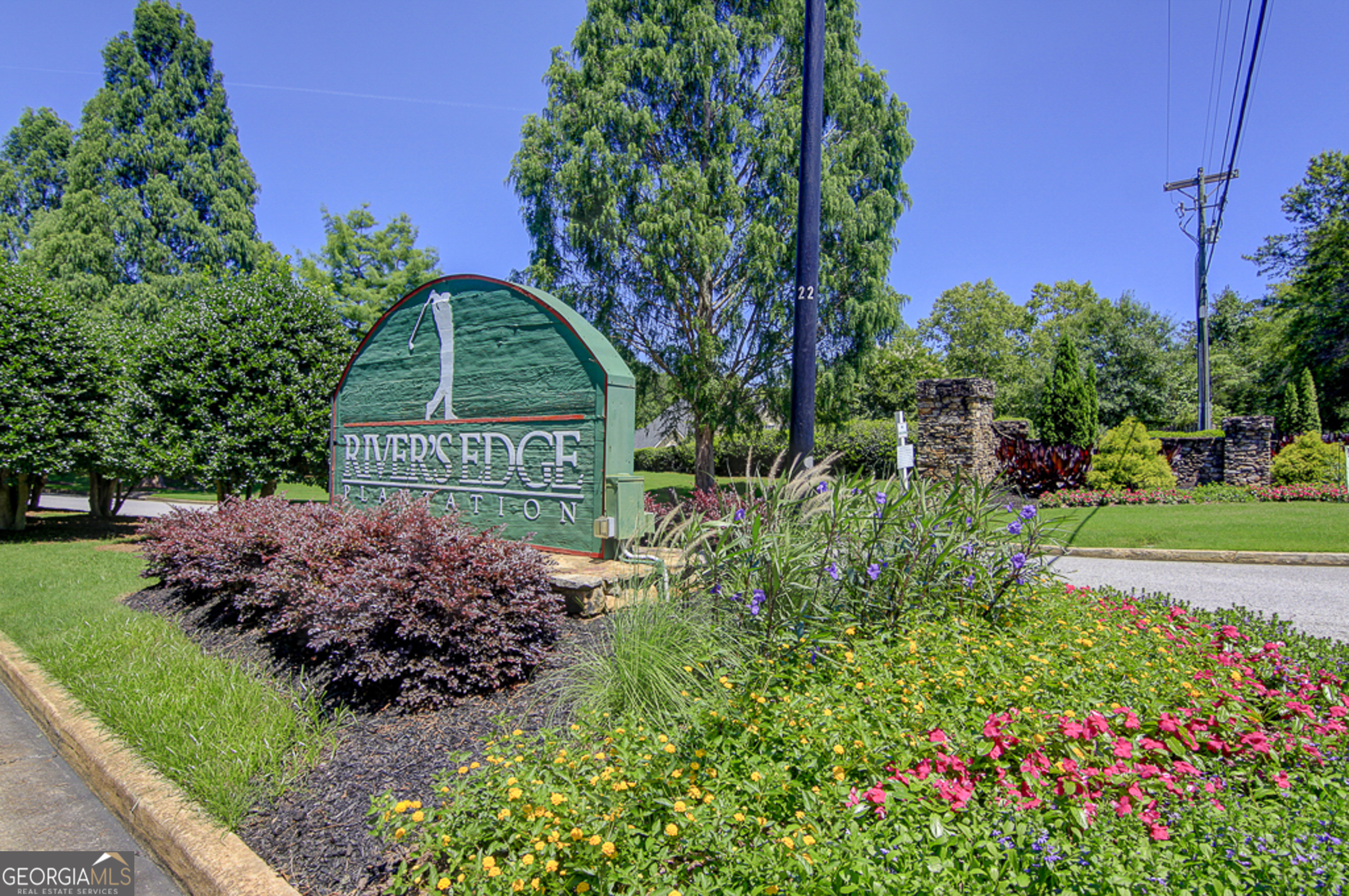 12350 Riviera Drive Fayetteville, GA 30215 - Photo 47 of 49 a view of a sign in a garden