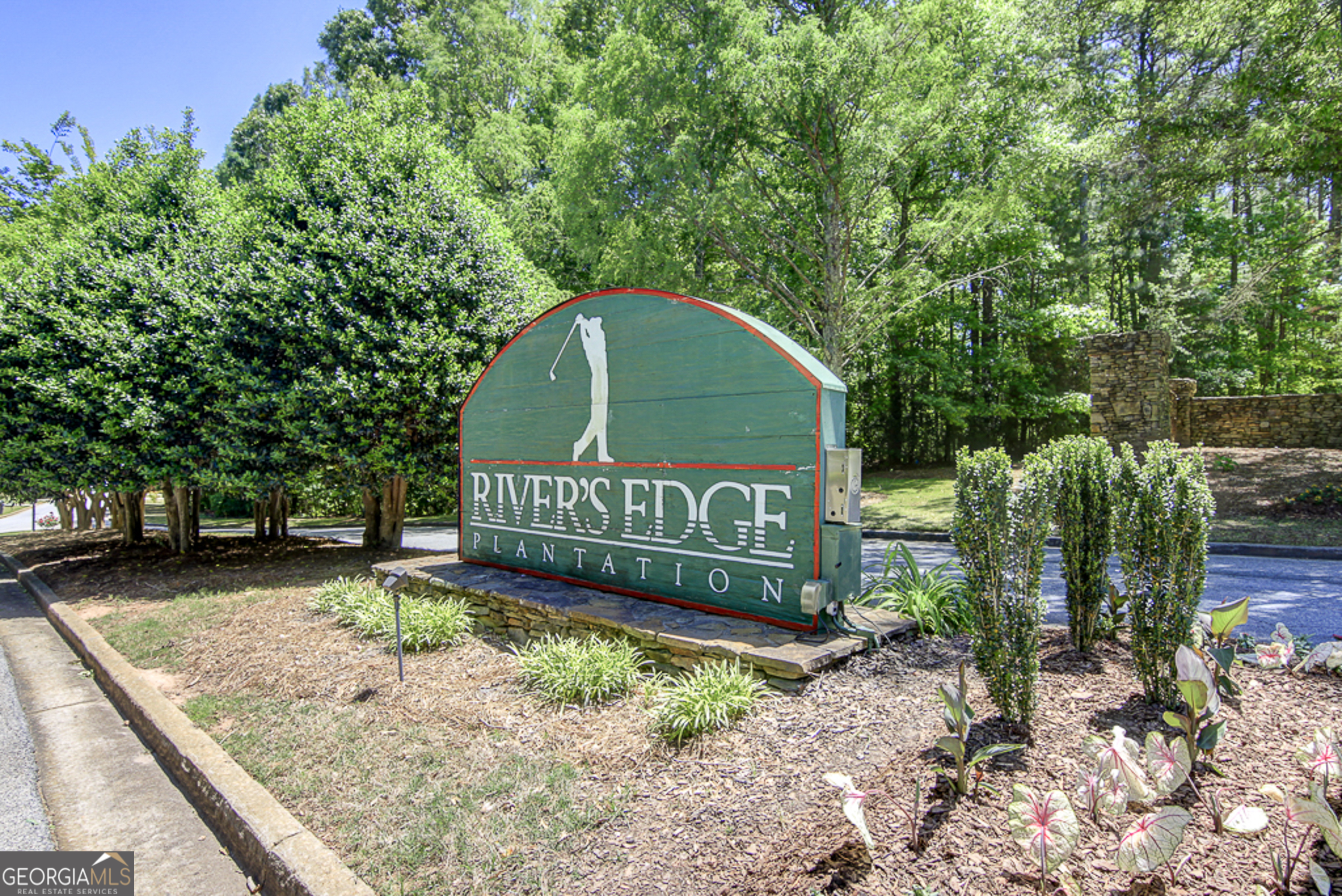 12350 Riviera Drive Fayetteville, GA 30215 - Photo 49 of 49 a view of a park with a bench and a tree