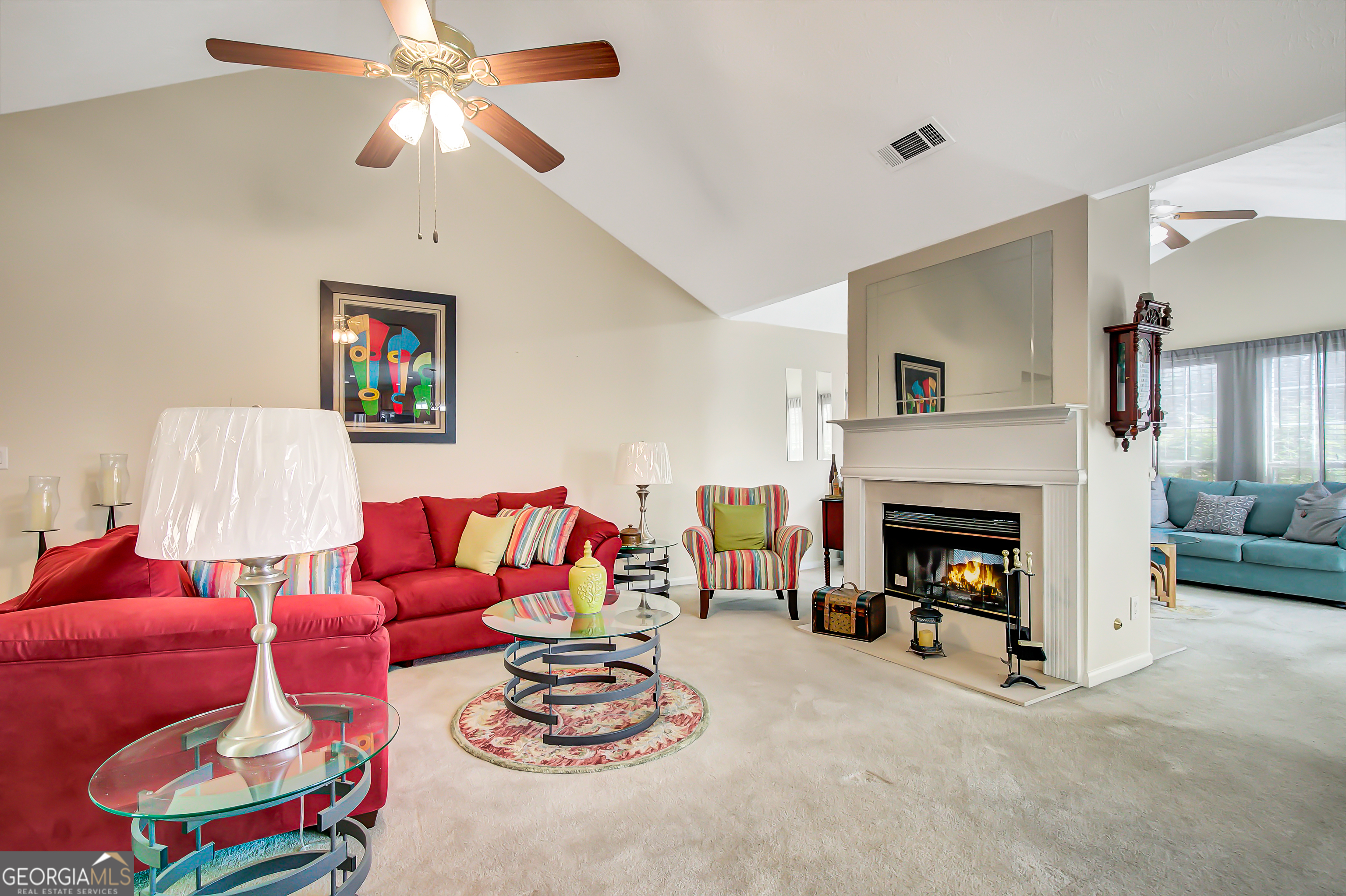 12350 Riviera Drive Fayetteville, GA 30215 - Photo 9 of 49 a living room with furniture and a fireplace