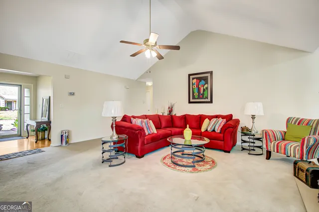 a view of a livingroom with furniture and a couch
