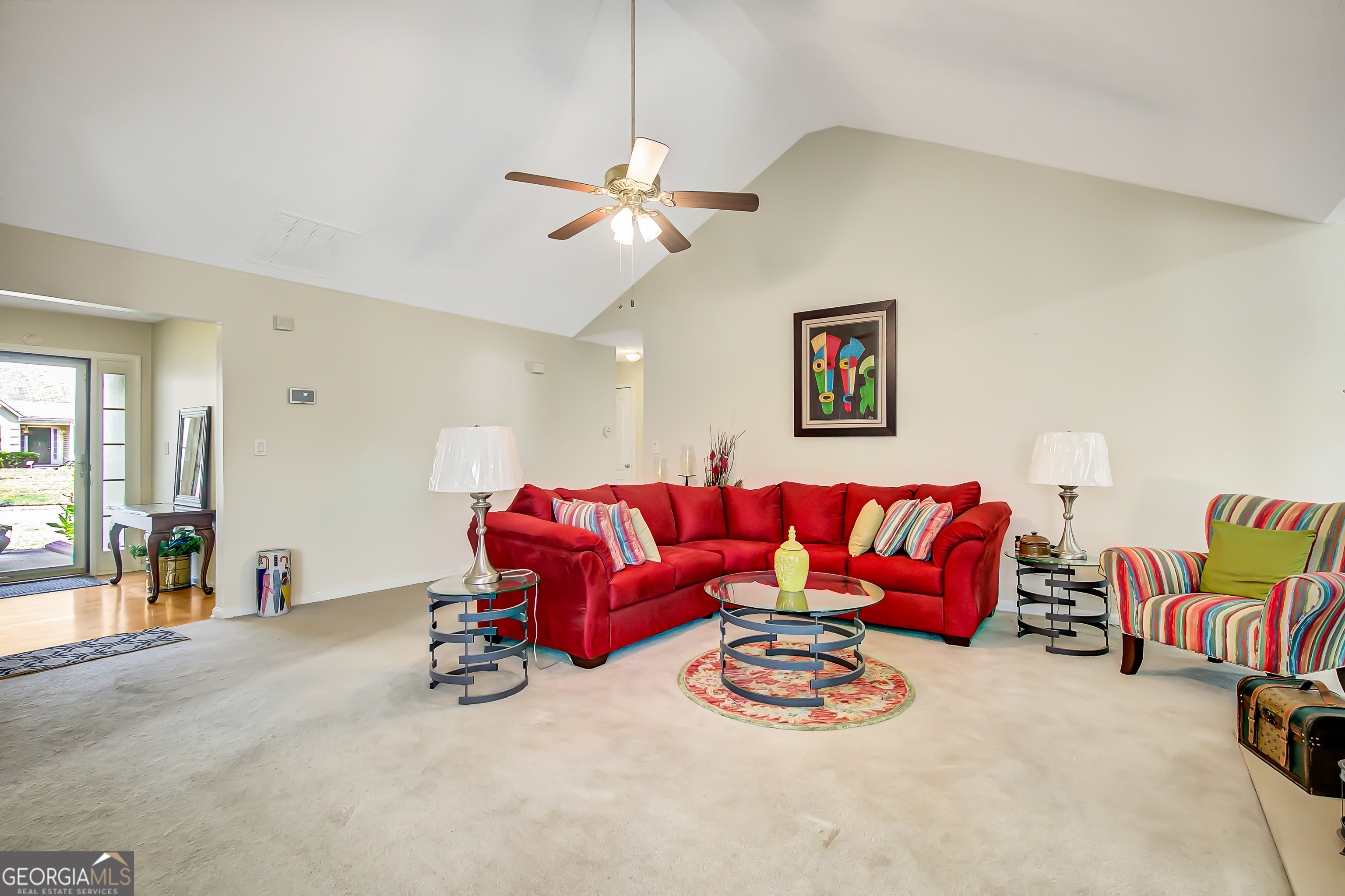 12350 Riviera Drive Fayetteville, GA 30215 - Photo 10 of 49 a view of a livingroom with furniture and a couch