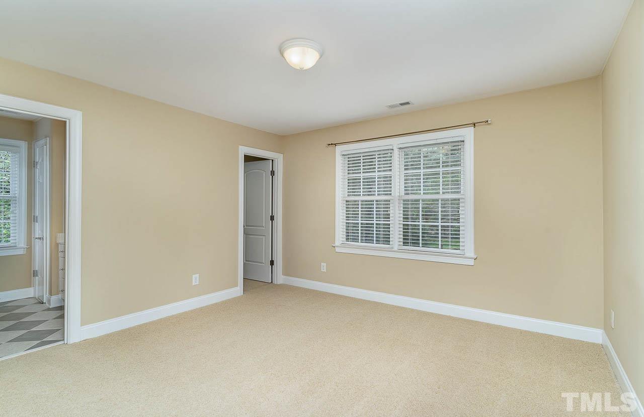 1317 Wynncrest Court Raleigh, NC 27603 - Photo 21 of 35 an empty room with a window