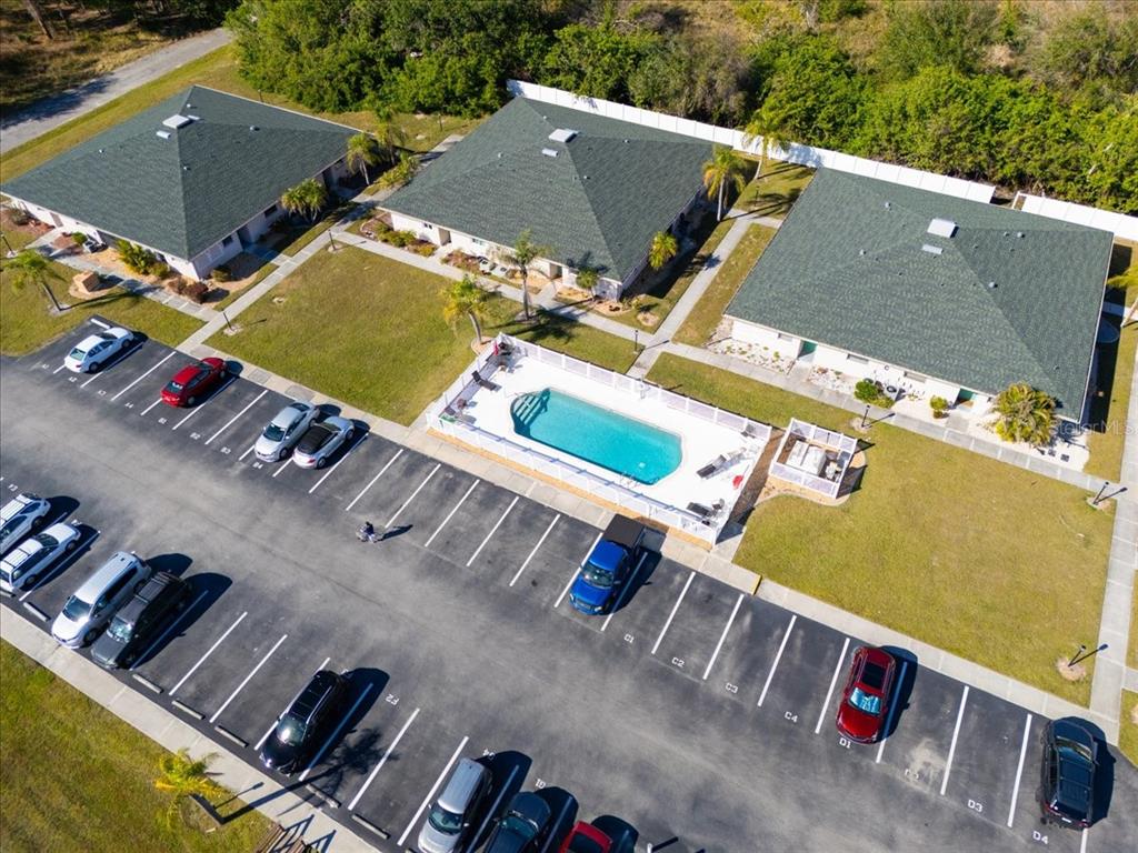 24540 Harbor View Road, Unit F1 Punta Gorda, FL 33980 - Photo 1 of 1 an aerial view of residential house with outdoor space