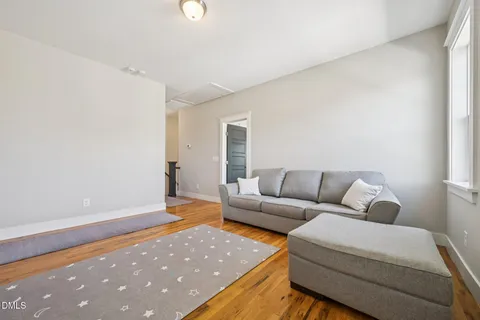 a room with a bed and a table in it