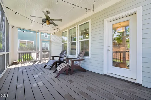 a view of outdoor space with deck and yard
