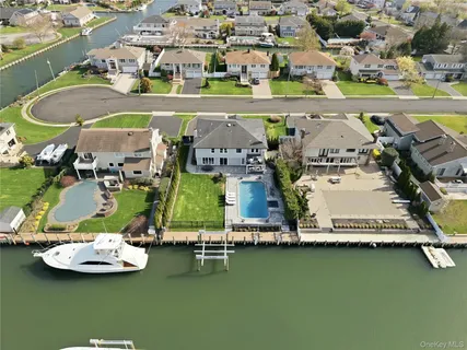 an aerial view of a water with boats and
