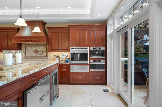 a view of a livingroom with furniture and a fireplace