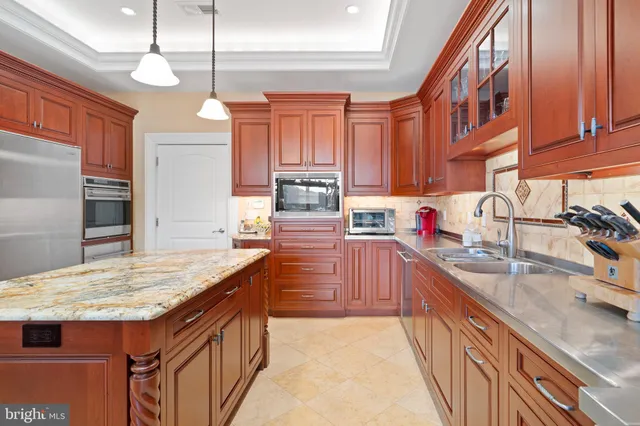a bathroom with a sink a mirror and a shower