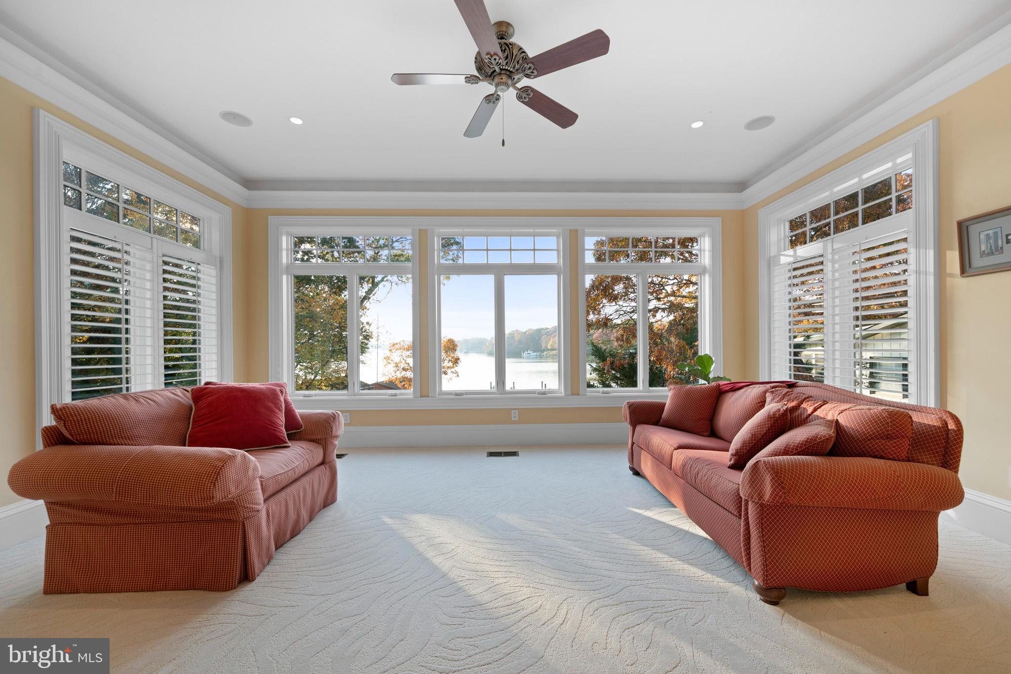 206 Harbor Drive Lusby, MD 20657 - Photo 42 of 109 a living room with furniture and a large window