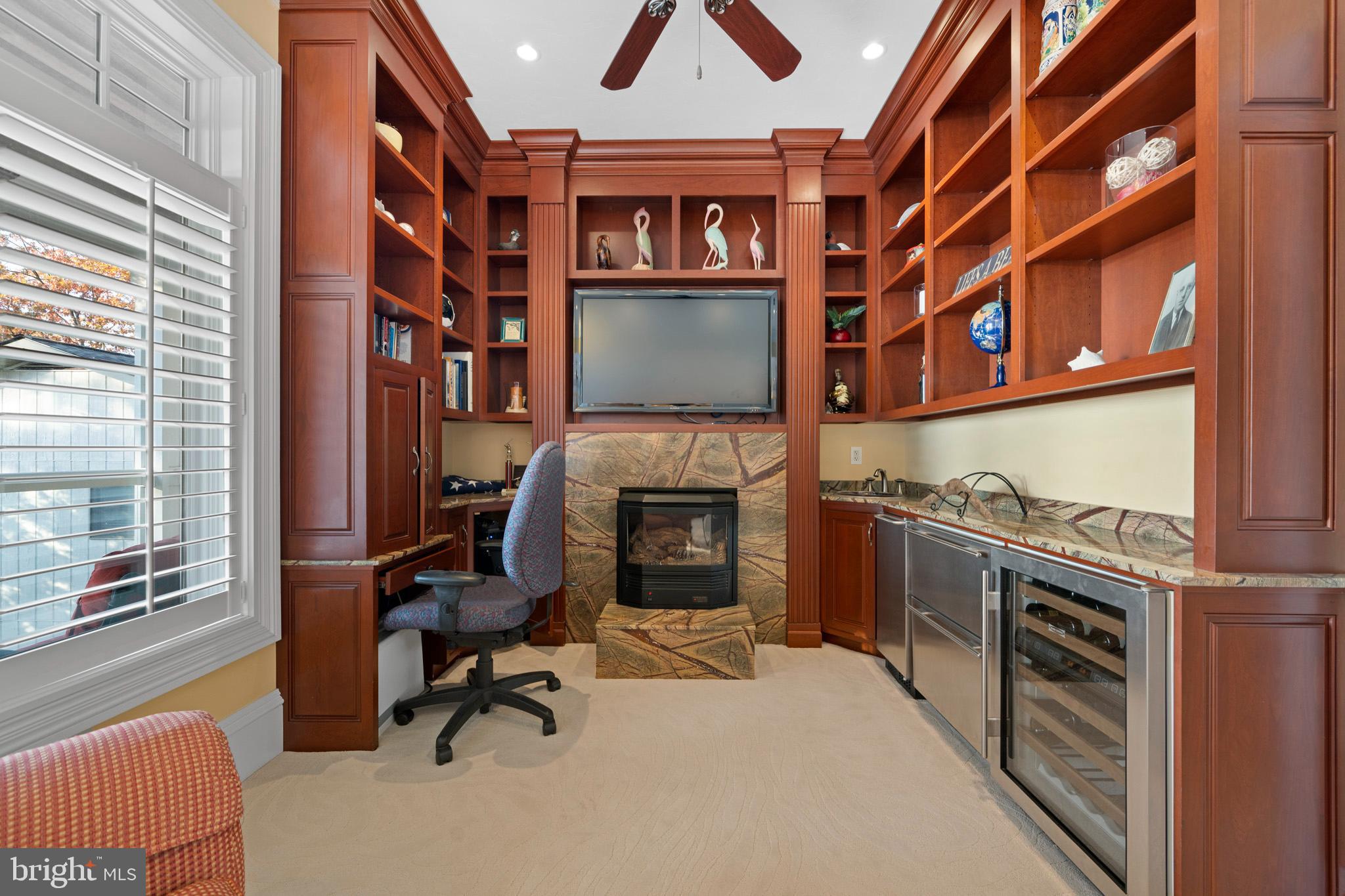 206 Harbor Drive Lusby, MD 20657 - Photo 43 of 109 a view of a livingroom with furniture and a fireplace