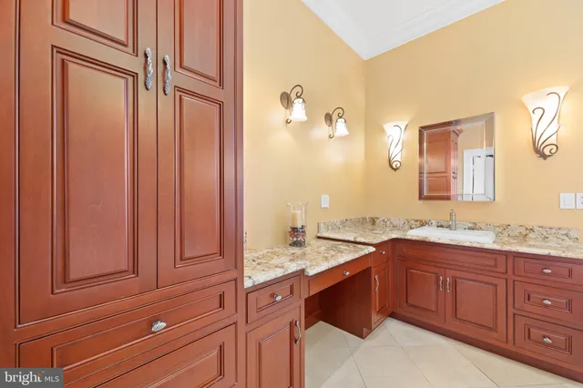 a view of residential houses with outdoor space and lake view