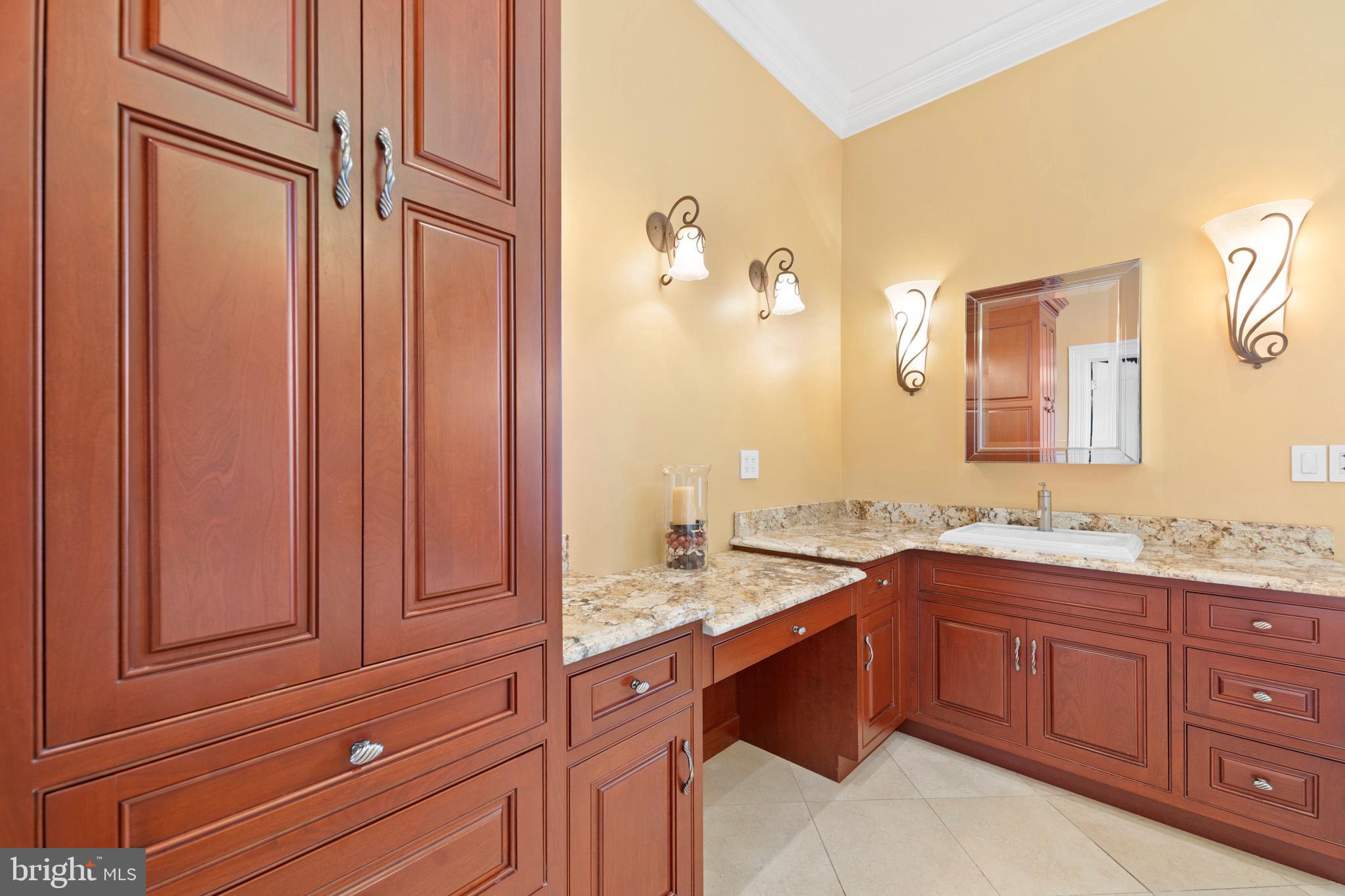 206 Harbor Drive Lusby, MD 20657 - Photo 47 of 109 a bathroom with a granite countertop sink and a mirror
