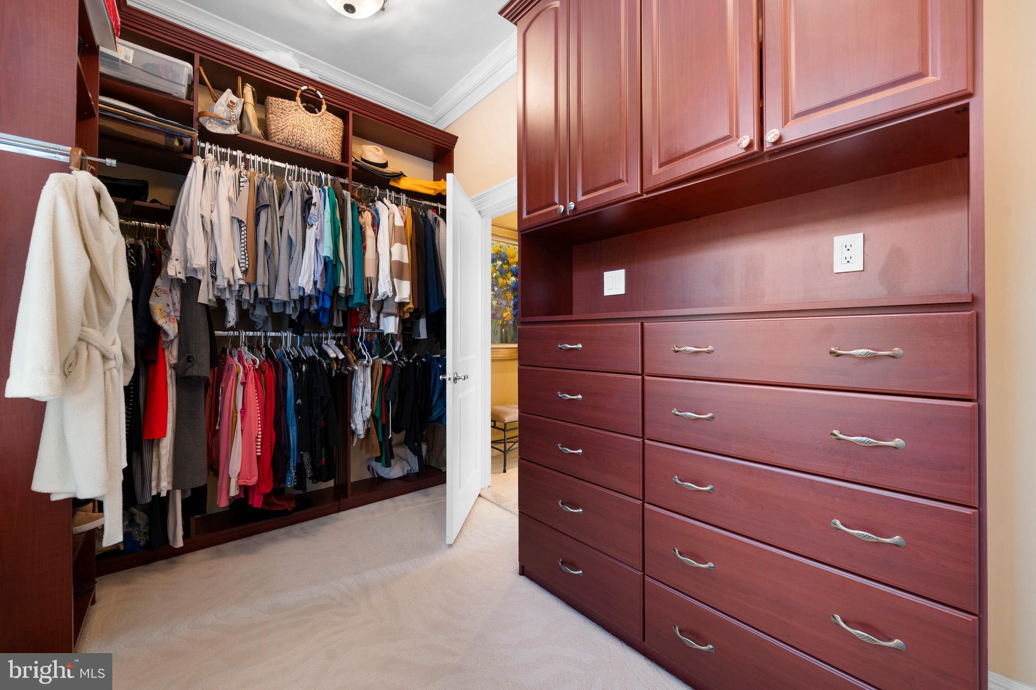 206 Harbor Drive Lusby, MD 20657 - Photo 49 of 109 a view of walk in closet with clothes