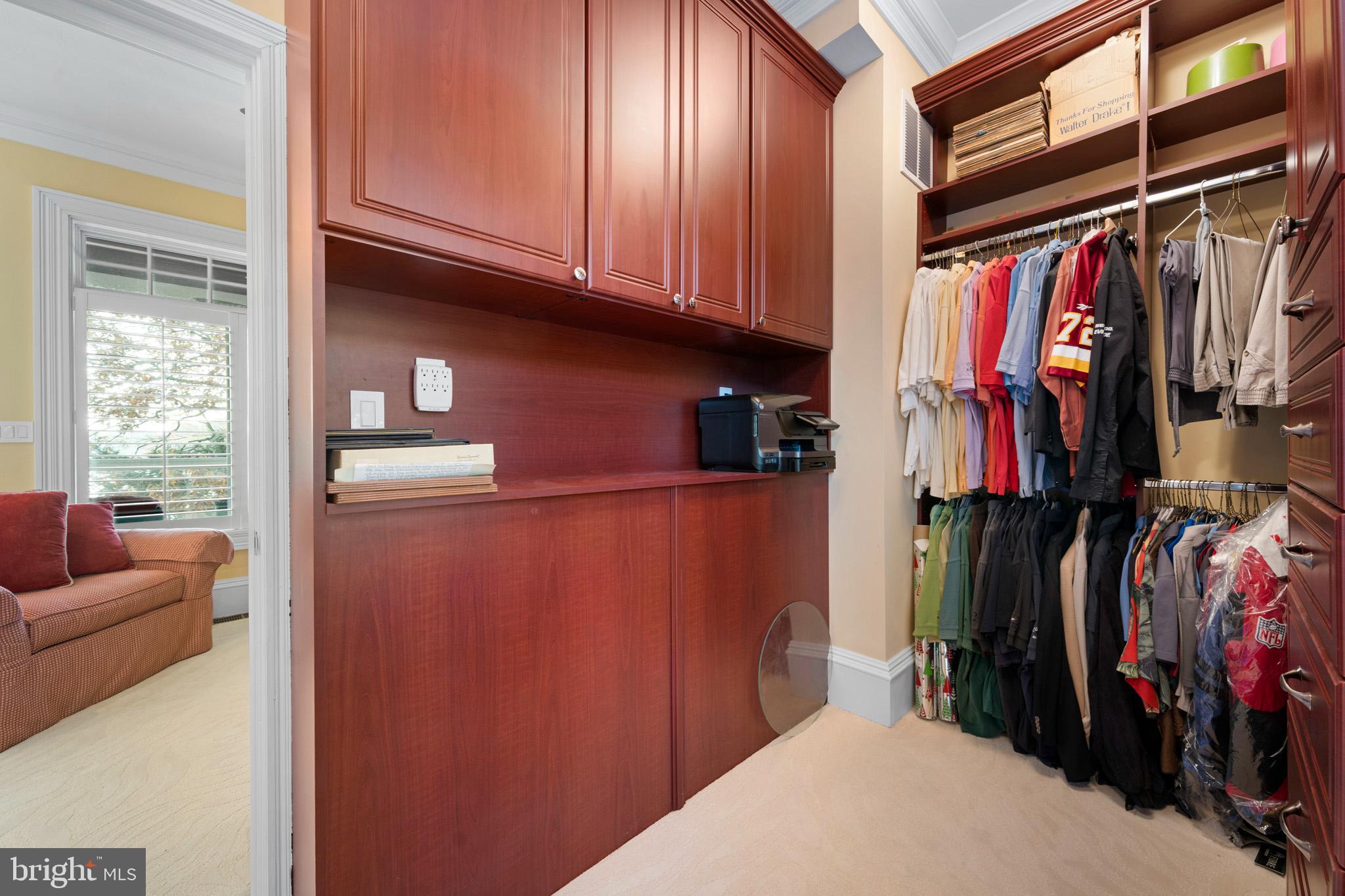 206 Harbor Drive Lusby, MD 20657 - Photo 50 of 109 a view of walk in closet with clothes and shoes