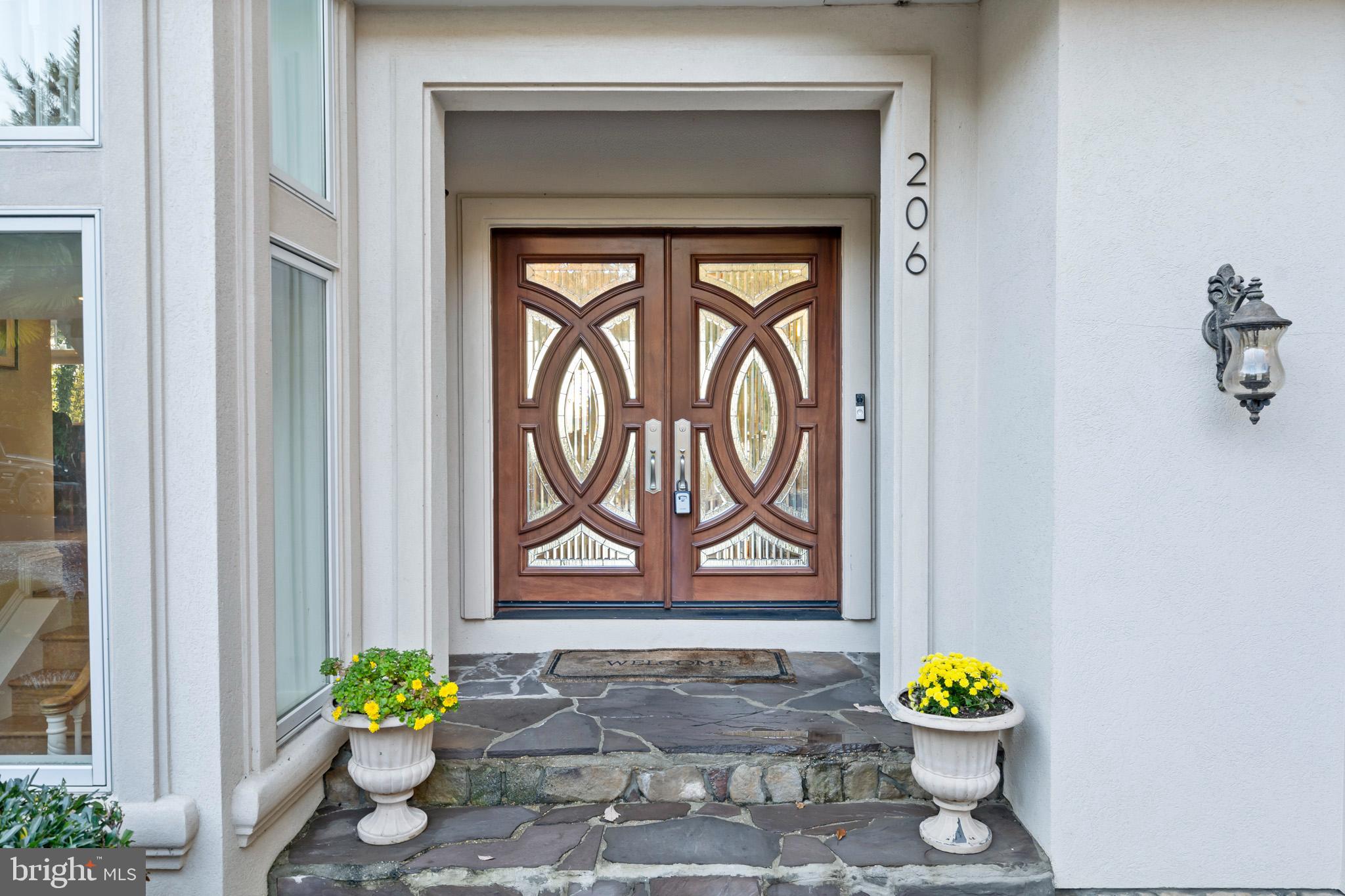 206 Harbor Drive Lusby, MD 20657 - Photo 5 of 109 a front view of a house with a window