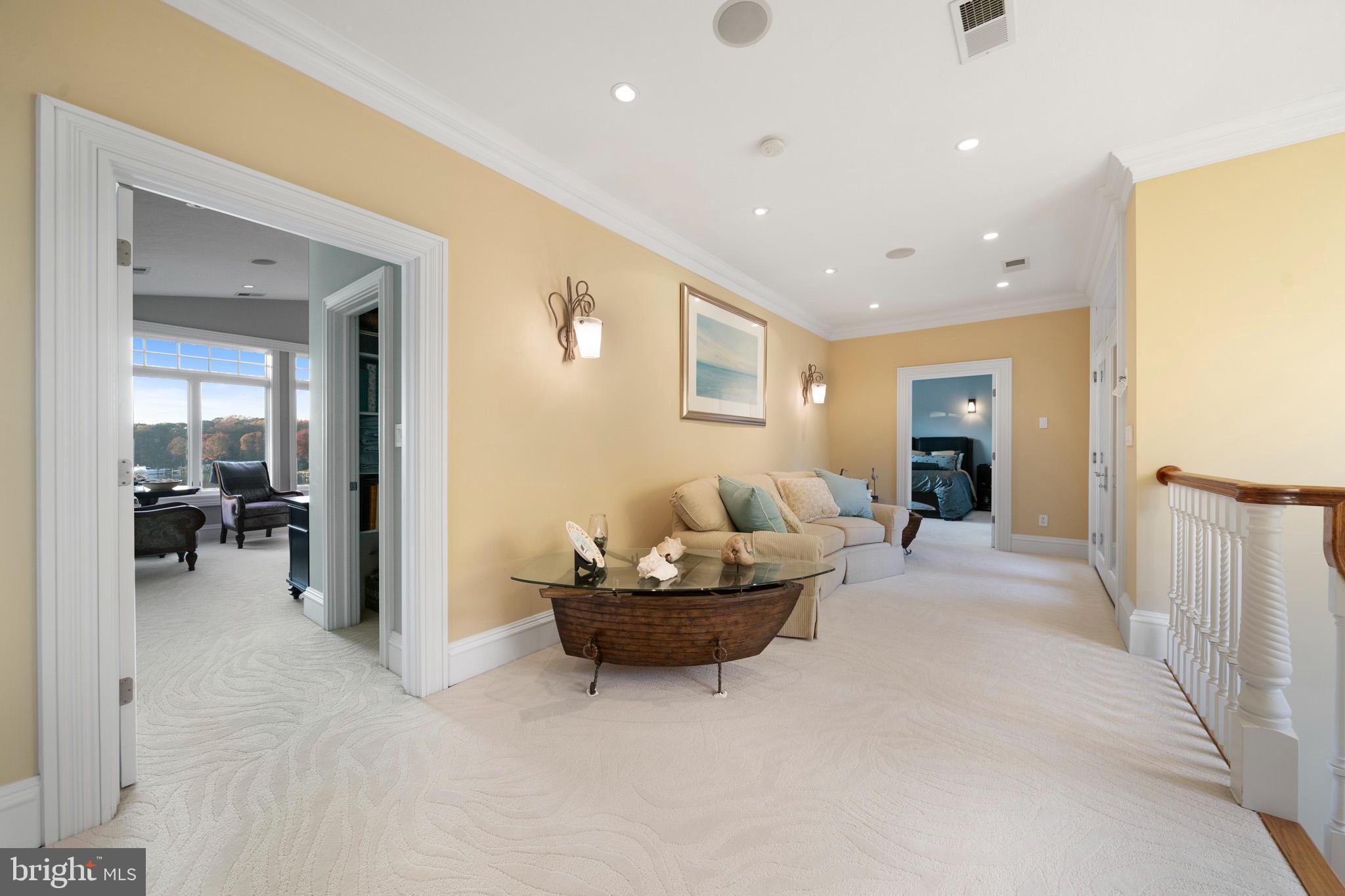 206 Harbor Drive Lusby, MD 20657 - Photo 55 of 109 a living room with furniture and a table