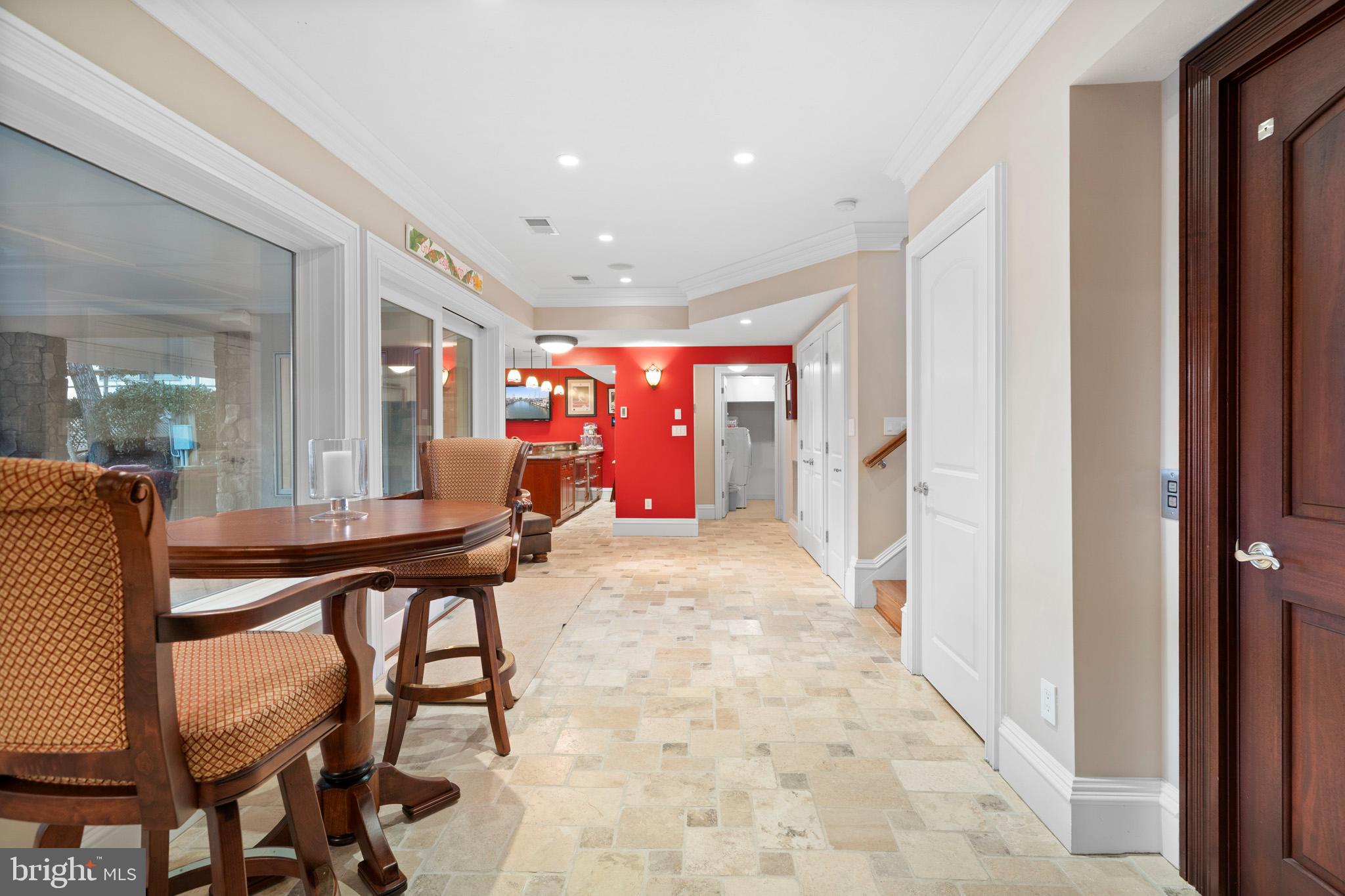 206 Harbor Drive Lusby, MD 20657 - Photo 71 of 109 a view of a hallway with furniture and window