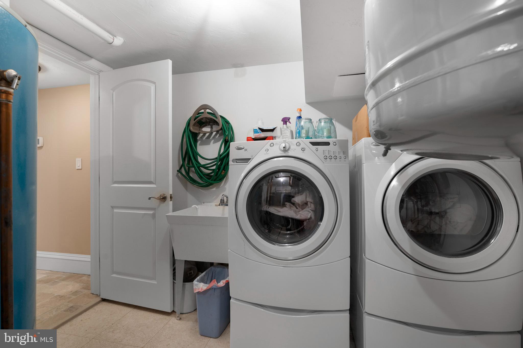 206 Harbor Drive Lusby, MD 20657 - Photo 78 of 109 a utility room with dryer and washer