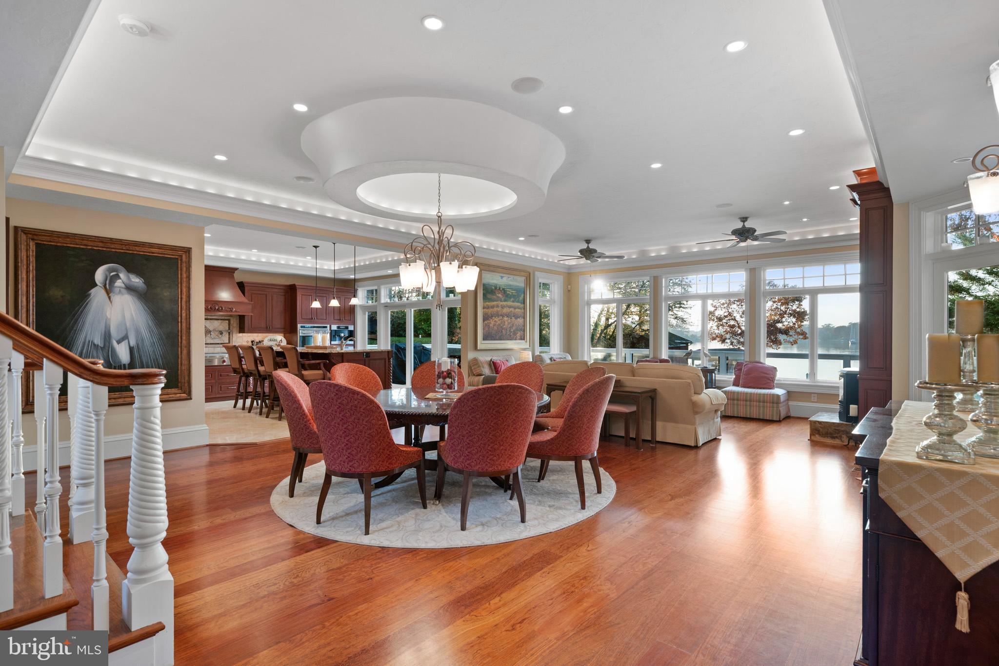 206 Harbor Drive Lusby, MD 20657 - Photo 8 of 109 a view of a dining room with furniture window and wooden floor
