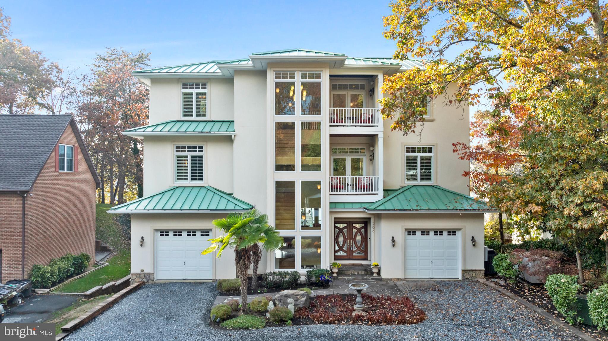 206 Harbor Drive Lusby, MD 20657 - Photo 90 of 109 a front view of a house with garden