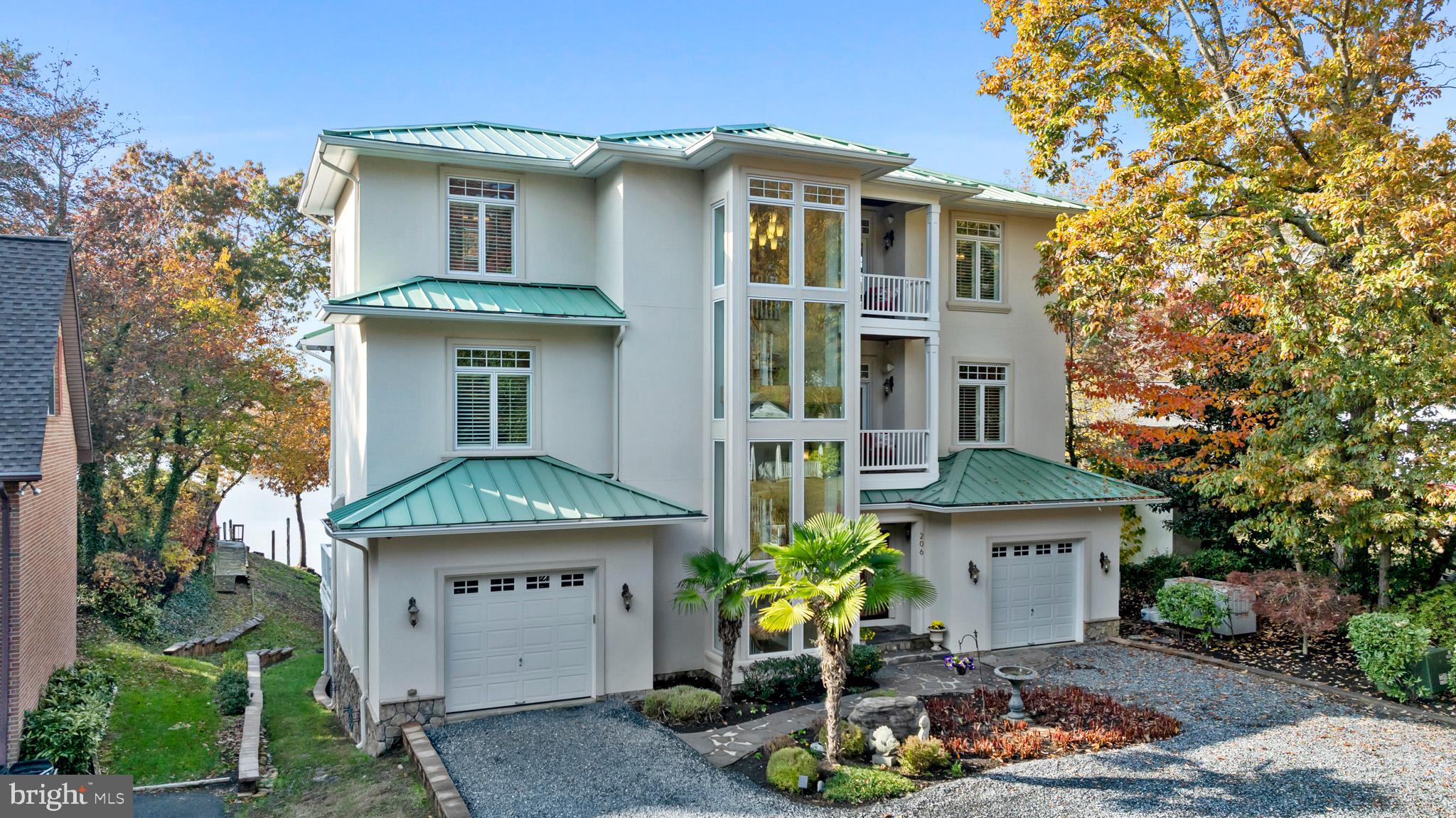 206 Harbor Drive Lusby, MD 20657 - Photo 99 of 109 a front view of a house with a yard