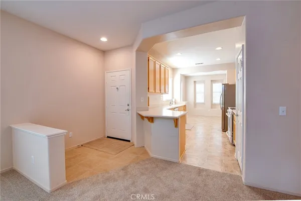 a view of a kitchen with a sink