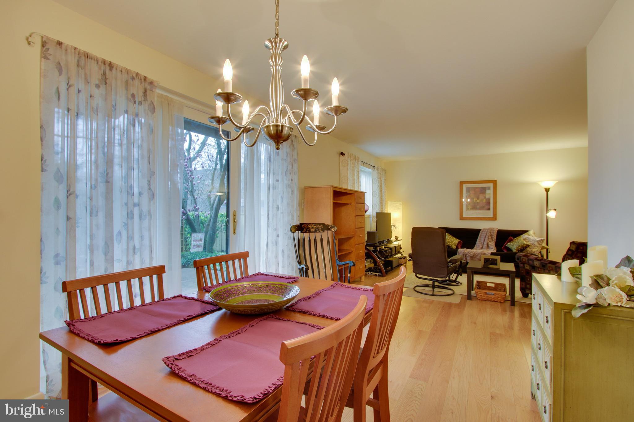 5 Hamill Road, Unit 5B Baltimore, MD 21210 - Photo 7 of 27 Dining room with slider opening to private patio.