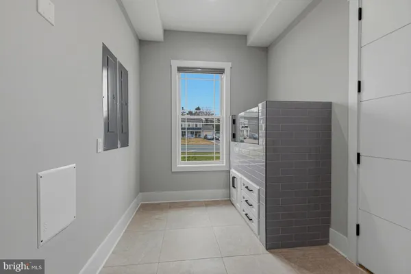 a bedroom with a bed and furniture