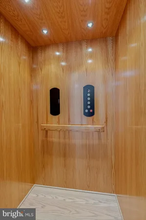 a utility room with sink dryer and washer
