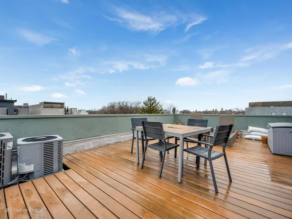a view of a terrace with seating area