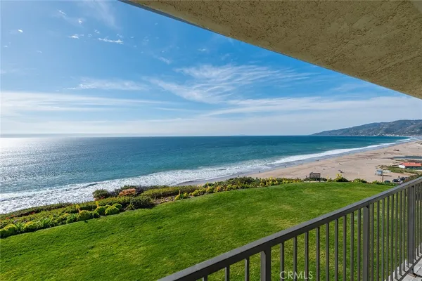 a view of an ocean from a balcony