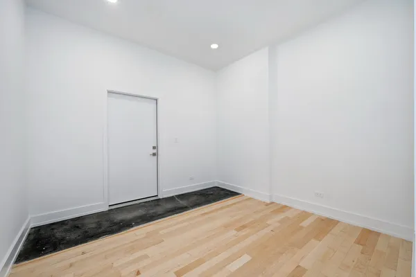 a bedroom with a bed and furniture