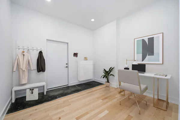 a bathroom with a toilet and a sink