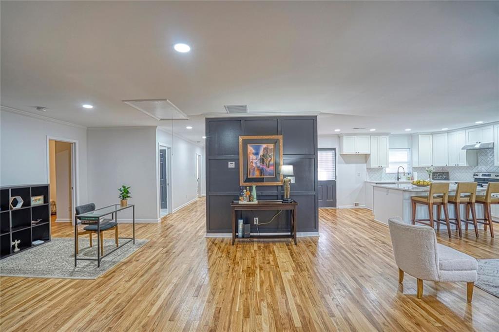 2230 Beecher Circle Southwest Atlanta, GA 30311 - Photo 12 of 29 a living room with furniture and a wooden floor