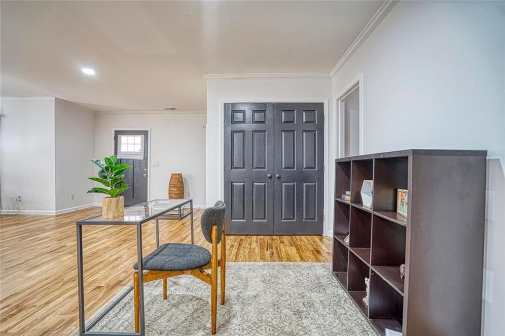 2230 Beecher Circle Southwest Atlanta, GA 30311 - Photo 13 of 29 a room with furniture and a potted plant