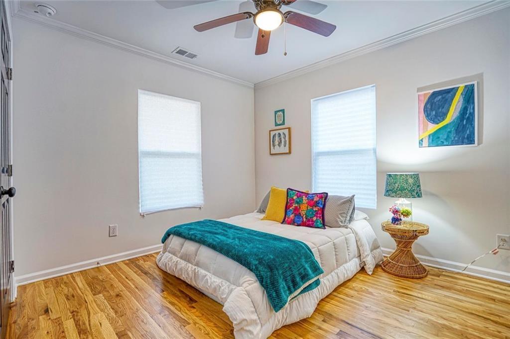 2230 Beecher Circle Southwest Atlanta, GA 30311 - Photo 15 of 29 a bedroom with a bed and a window