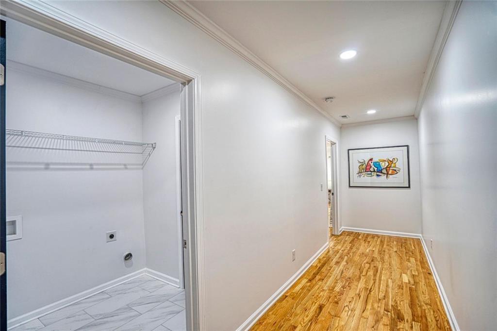 2230 Beecher Circle Southwest Atlanta, GA 30311 - Photo 20 of 29 a view of a hallway with wooden floor