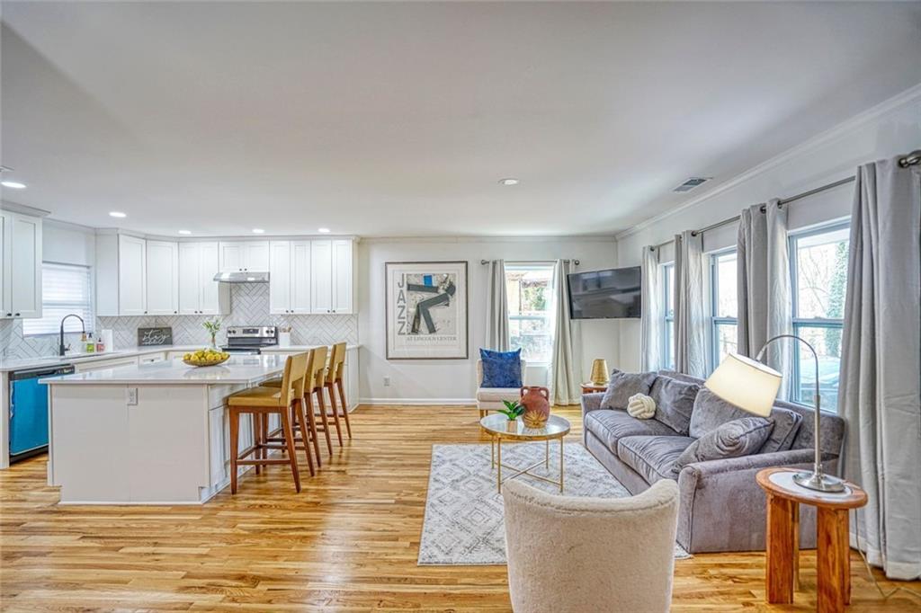 2230 Beecher Circle Southwest Atlanta, GA 30311 - Photo 2 of 29 a living room with furniture and a large window