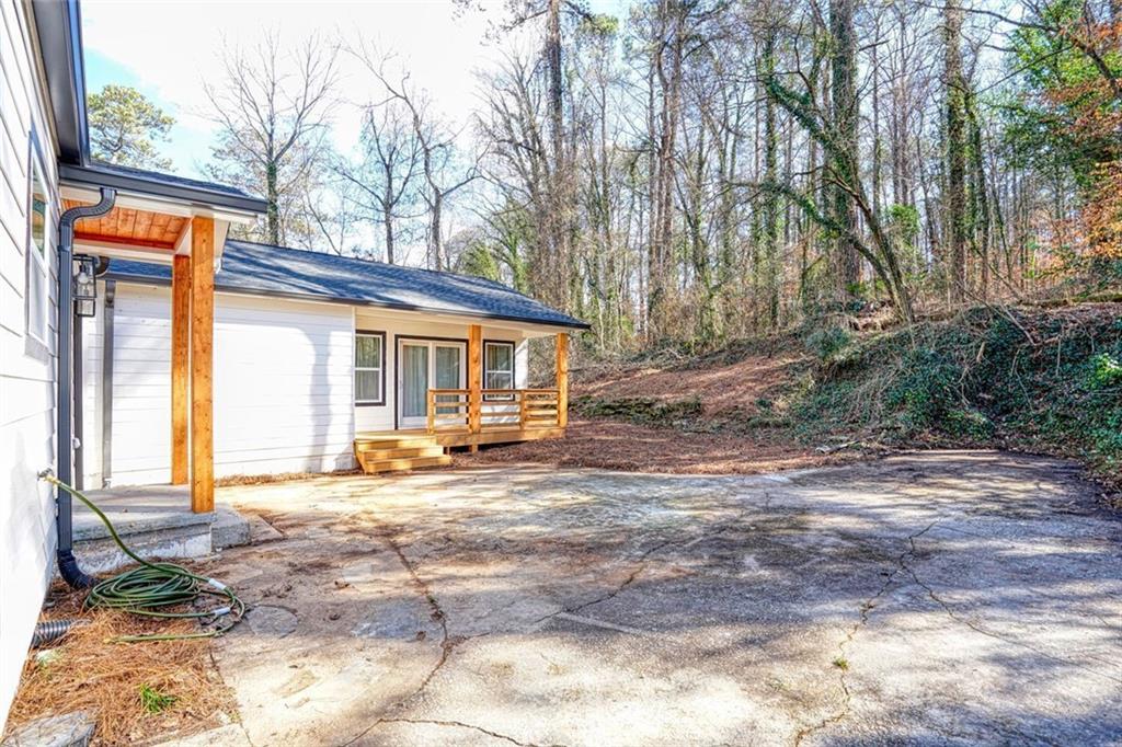 2230 Beecher Circle Southwest Atlanta, GA 30311 - Photo 26 of 29 a view of a house with backyard and sitting area
