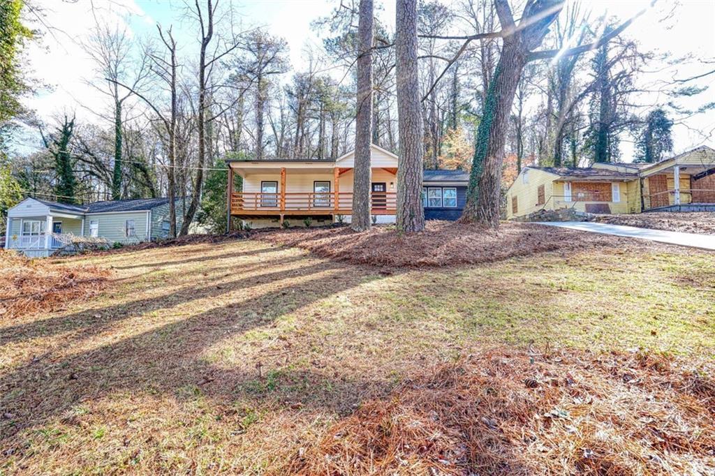 2230 Beecher Circle Southwest Atlanta, GA 30311 - Photo 29 of 29 a view of a house with a yard covered in snow