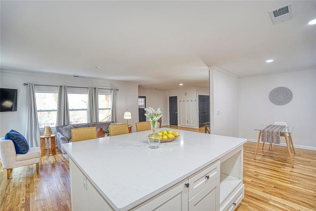 2230 Beecher Circle Southwest Atlanta, GA 30311 - Photo 8 of 29 a view of a dining room with furniture and wooden floor