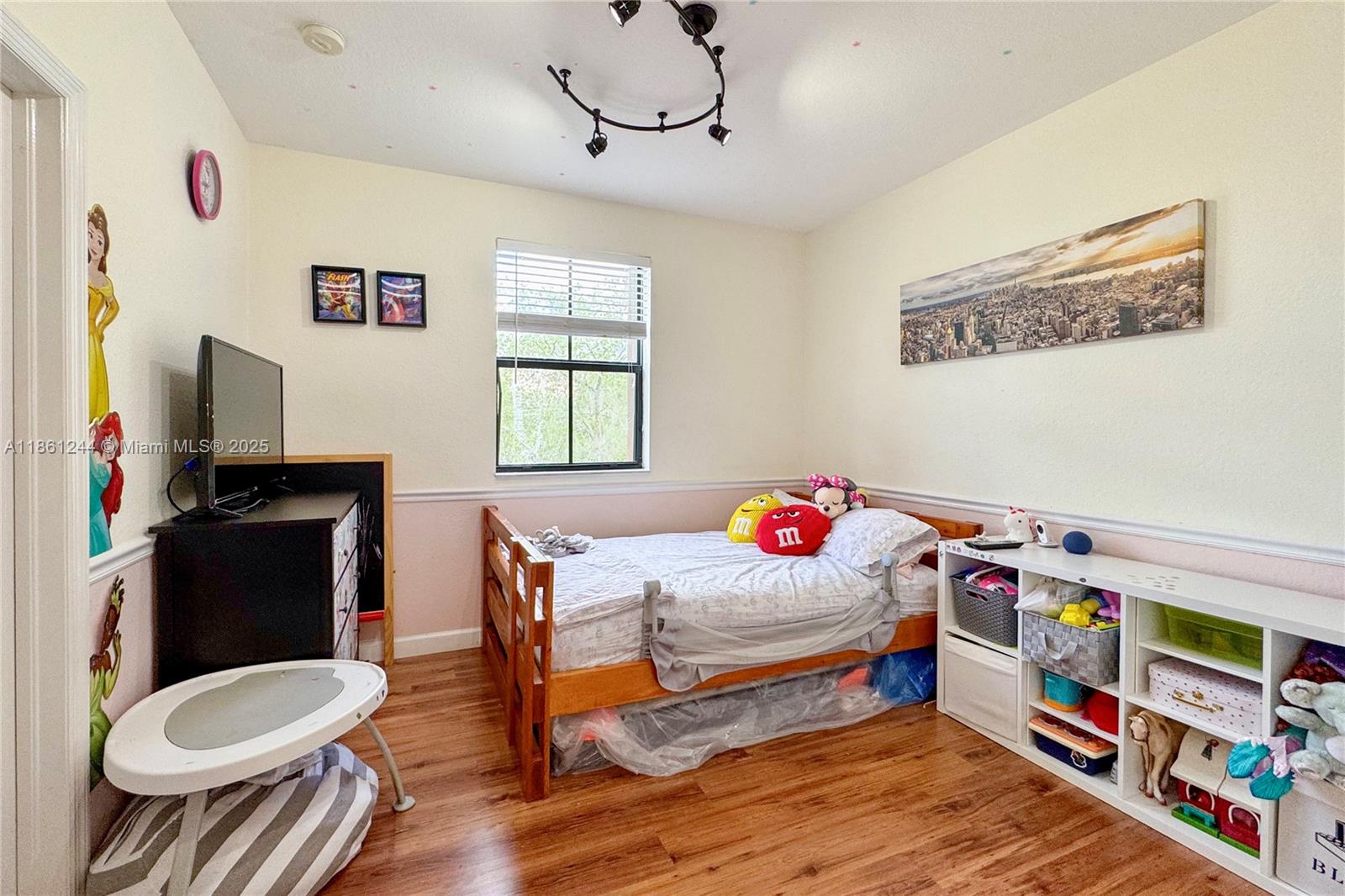 23745 Southwest 114 Court Homestead, FL 33032 - Photo 18 of 30 a bedroom with furniture and a window