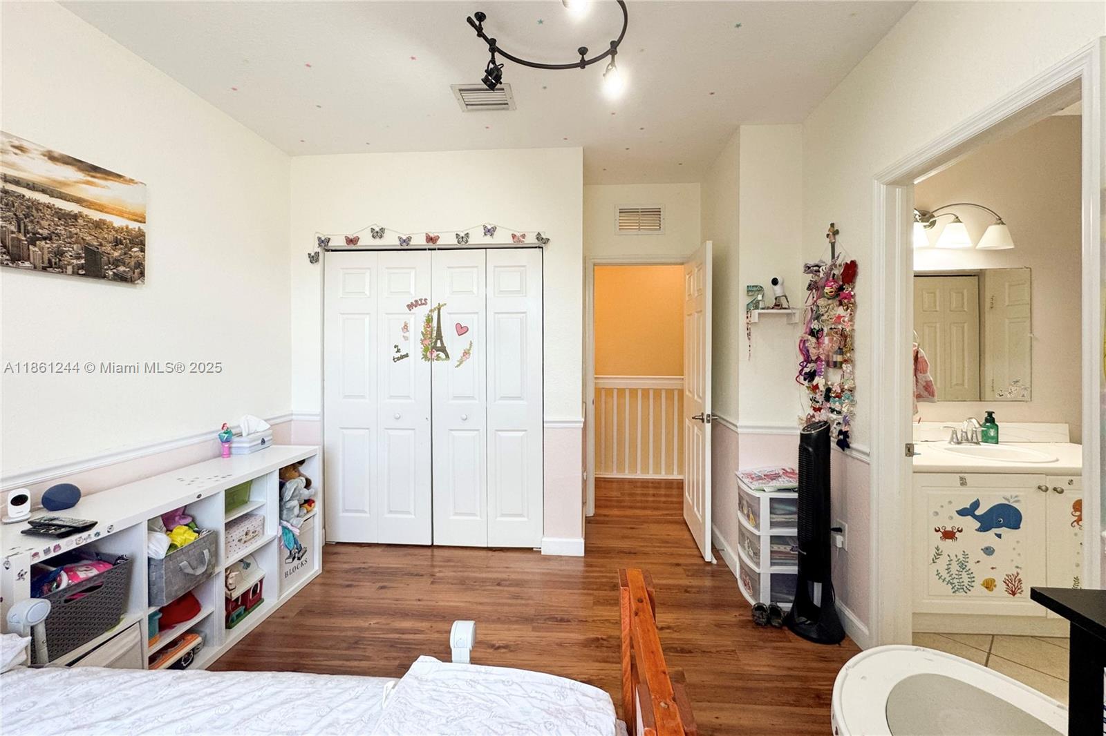 23745 Southwest 114 Court Homestead, FL 33032 - Photo 19 of 30 a very nice looking bedroom with a couch