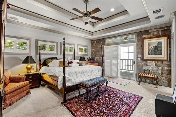a bed room with a bed and a couch