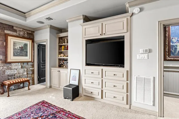 a view of living room with furniture and flat screen tv