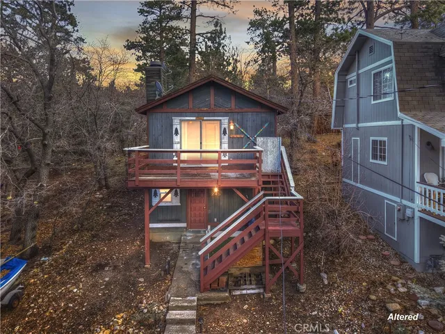 a view of a house with a small yard