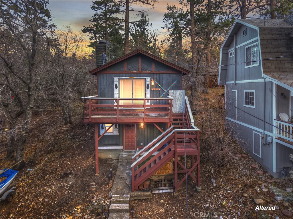 a view of a house with a small yard