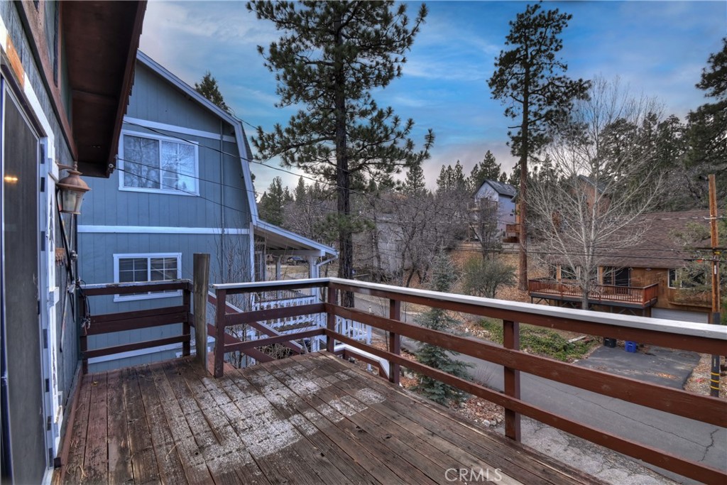 245 Vista Sugarloaf, CA 92386 - Photo 42 of 50 a view of a balcony with wooden fence and floor
