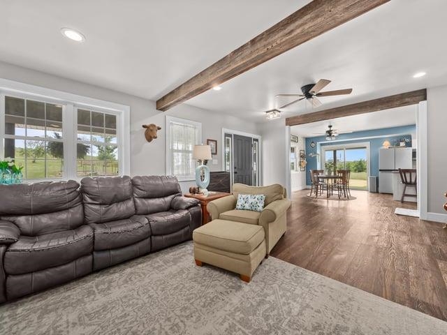 8294 North Leaf River Road Leaf River, IL 61047 - Photo 9 of 56 a living room with furniture and a wooden floor